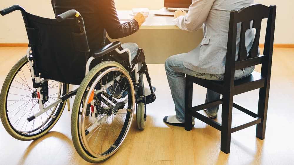 A disable person on wheelchair receiving disability benefit