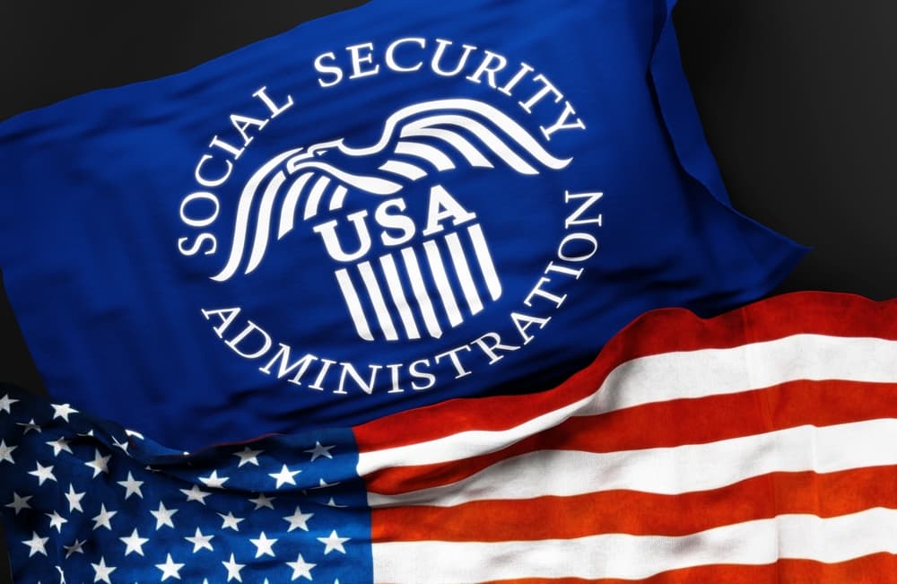 The flag of the United States Social Security Administration displayed alongside the American flag, symbolizing the connection between national governance and social welfare.