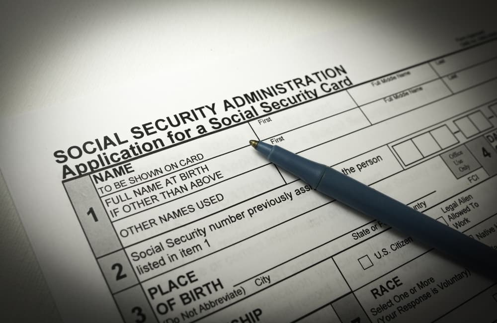 Social Security Form with a pen on top of paperwork