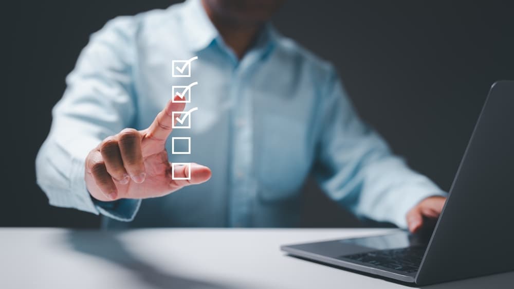 A person making checklist to contact SSA